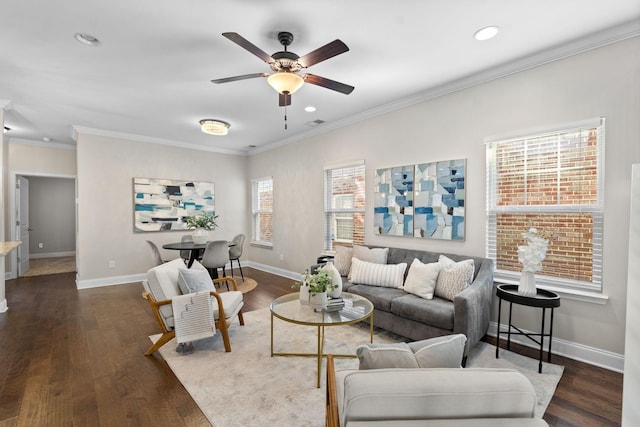 living room with ceiling fan, dark hardwood / wood-style flooring, and crown molding