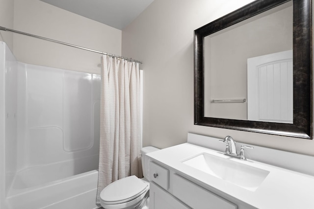 full bathroom with toilet, vanity, and shower / bath combo with shower curtain