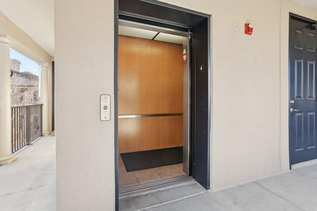 view of exterior entry with elevator