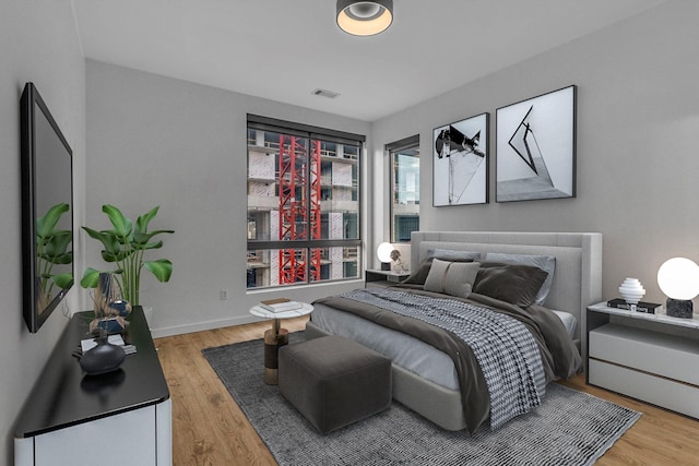 bedroom featuring hardwood / wood-style floors