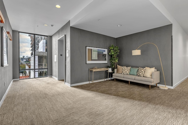 interior space featuring floor to ceiling windows and carpet flooring