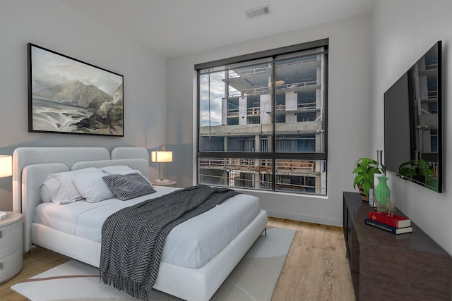 bedroom featuring wood-type flooring