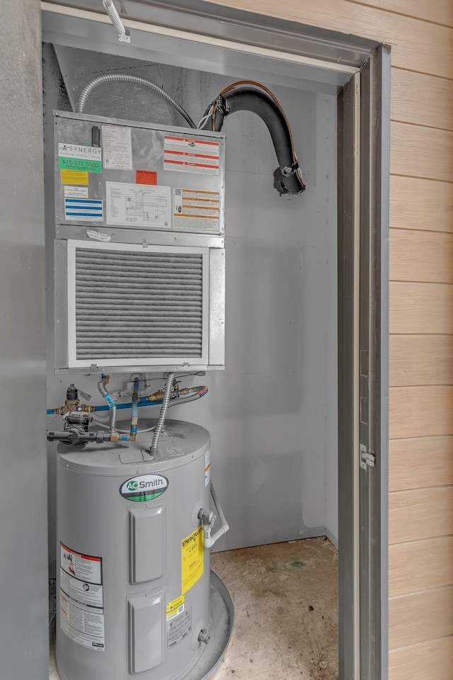 utility room with water heater