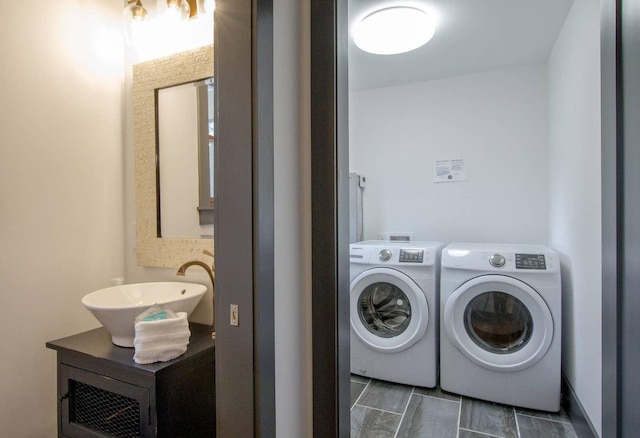 laundry area featuring sink and washing machine and clothes dryer