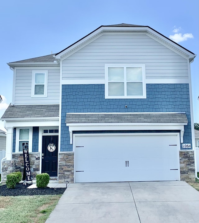 view of front of property featuring a garage