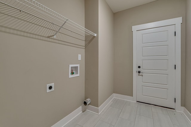 clothes washing area featuring electric dryer hookup and washer hookup