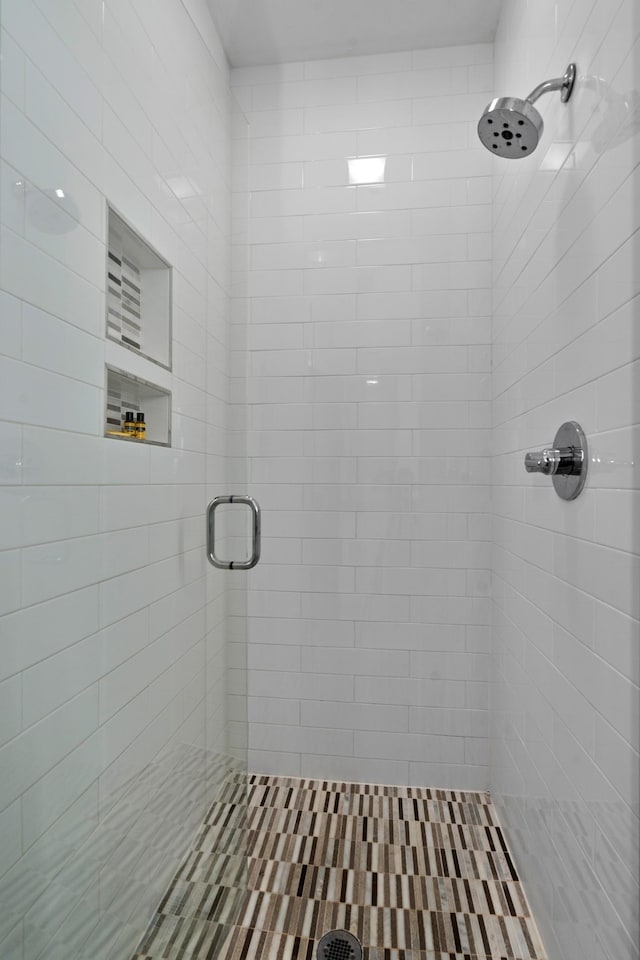 bathroom featuring an enclosed shower