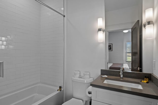 full bathroom with vanity, bathtub / shower combination, and toilet