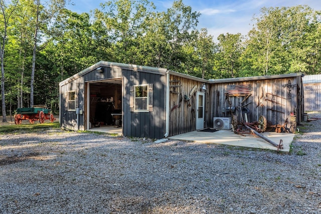 view of outbuilding with ac unit