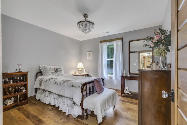 bedroom featuring hardwood / wood-style floors