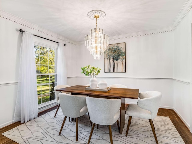 dining room featuring hardwood / wood-style floors and an inviting chandelier