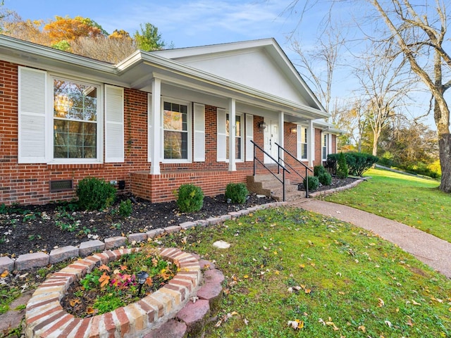 view of property exterior featuring a yard and a porch