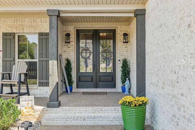 property entrance featuring french doors