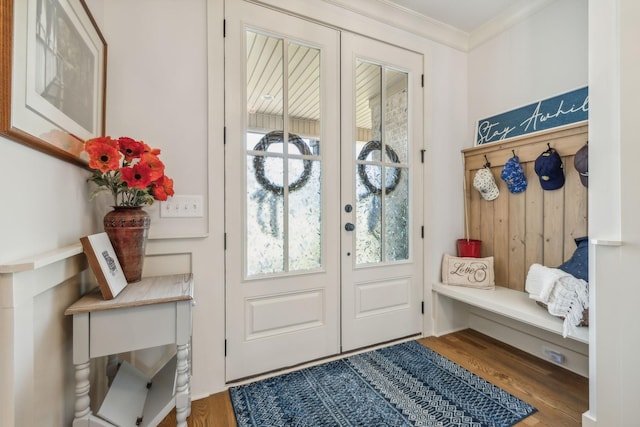 mudroom featuring ornamental molding, french doors, and hardwood / wood-style floors