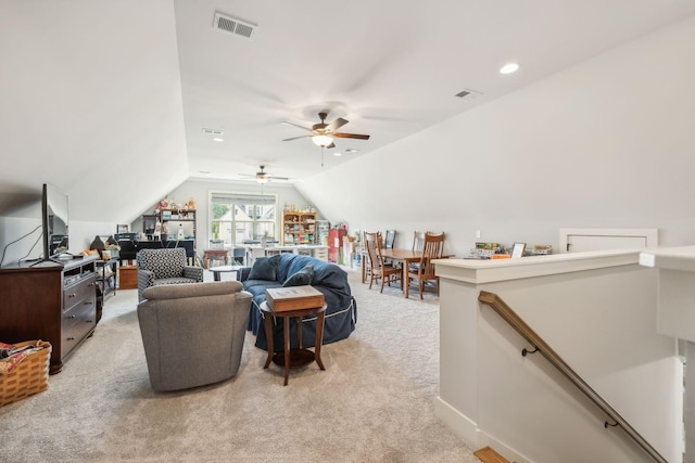 carpeted living room featuring lofted ceiling and ceiling fan