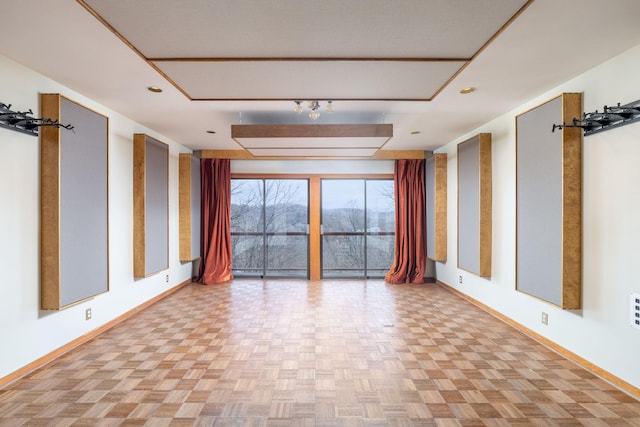 spare room featuring light parquet flooring