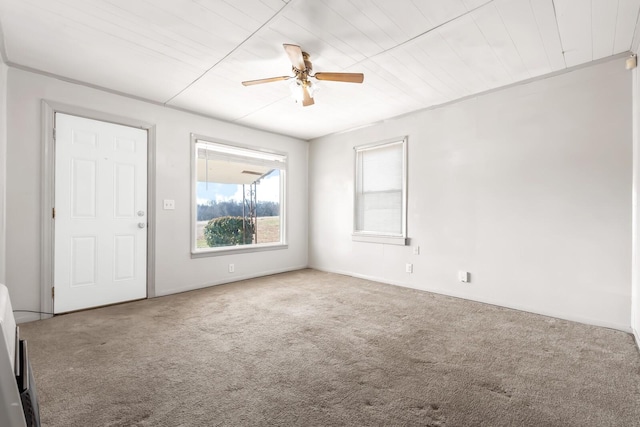 carpeted empty room with ceiling fan