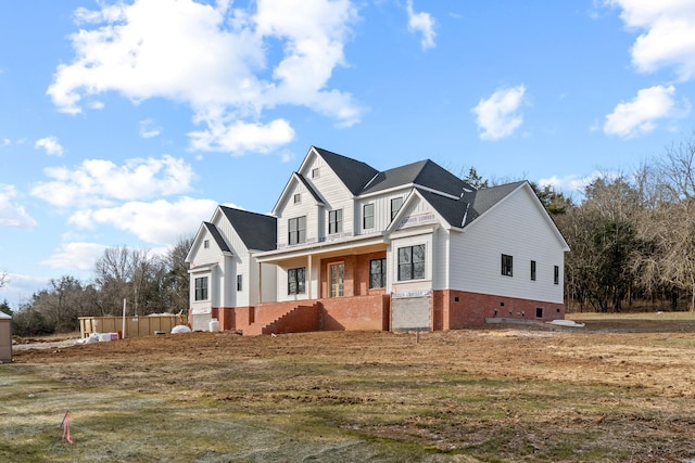 view of front of property featuring covered porch