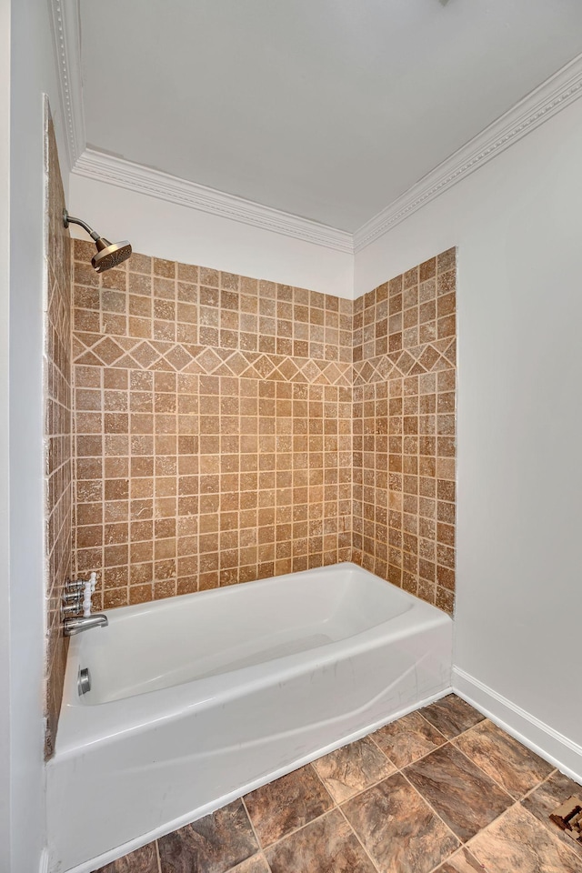 bathroom featuring crown molding and shower / tub combination