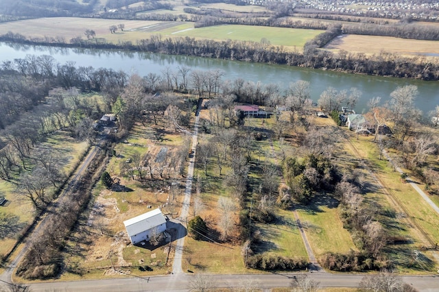 drone / aerial view featuring a water view and a rural view