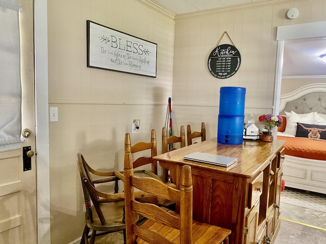 dining area featuring crown molding