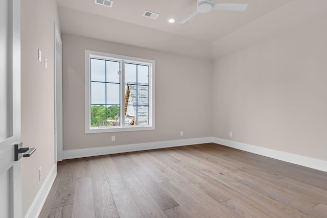 unfurnished room featuring light wood-type flooring and ceiling fan