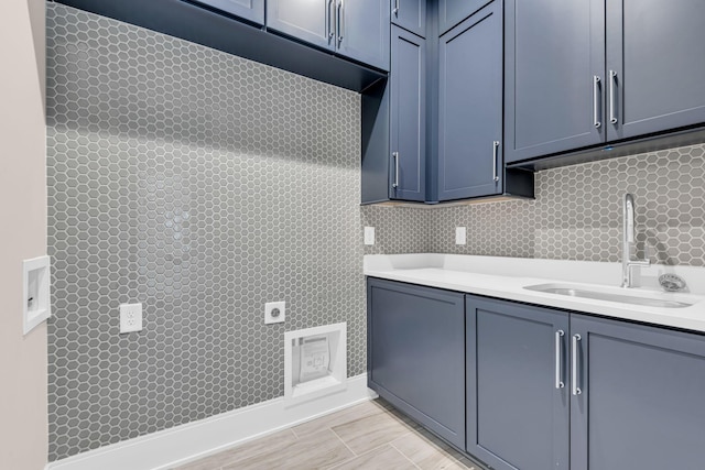 kitchen with tasteful backsplash and sink