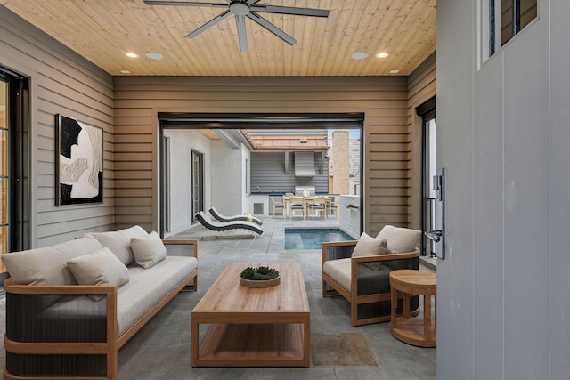 sunroom / solarium with ceiling fan and wooden ceiling