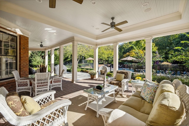 view of patio featuring ceiling fan and outdoor lounge area