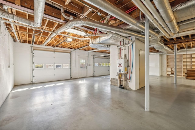 garage featuring tankless water heater