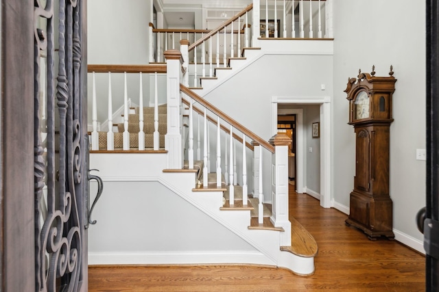 entryway with hardwood / wood-style flooring