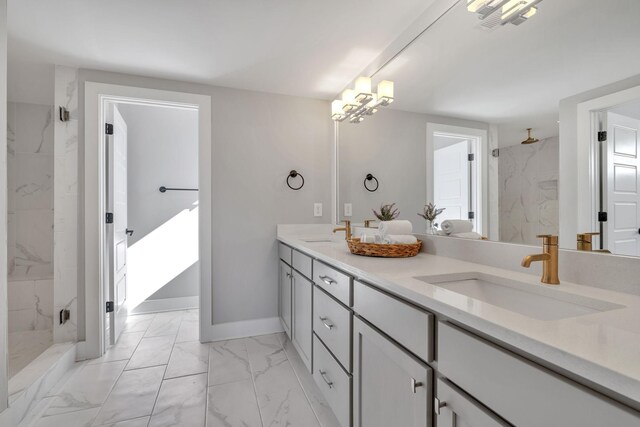 bathroom featuring a shower and vanity