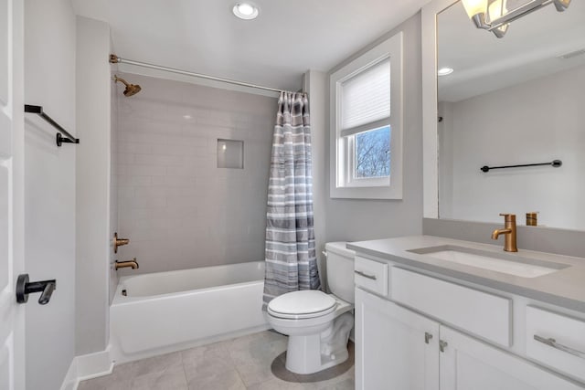 full bathroom featuring shower / bath combo with shower curtain, toilet, tile patterned flooring, and vanity