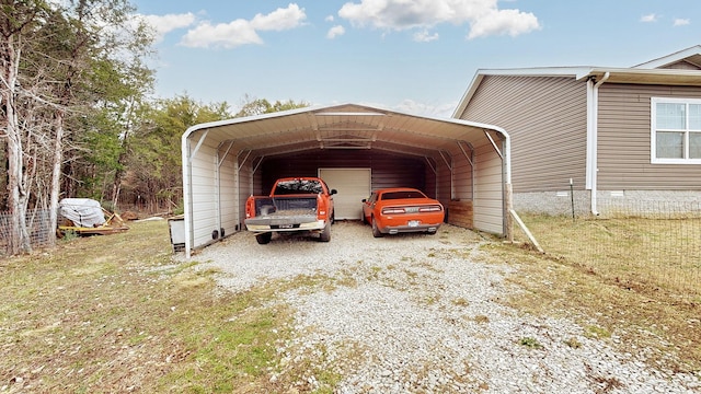 view of parking featuring a yard and a carport