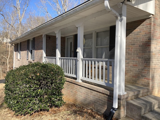 view of property exterior featuring a porch