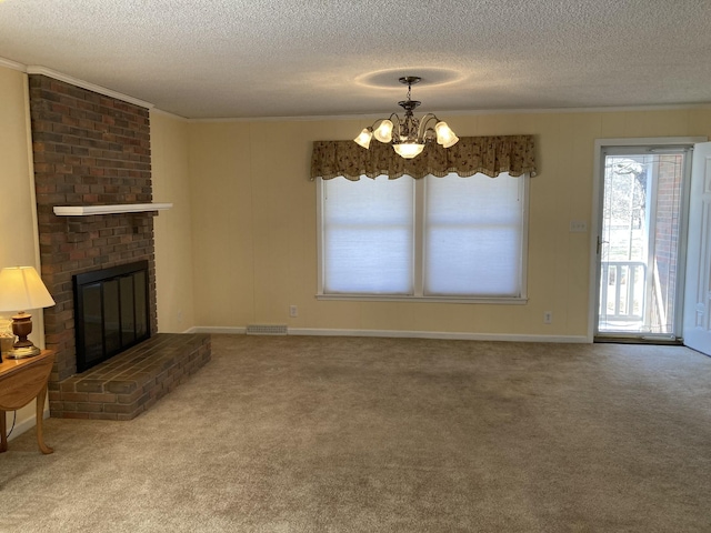 unfurnished living room featuring a textured ceiling, a brick fireplace, carpet, and a chandelier