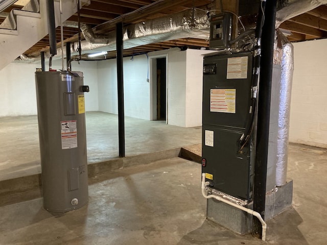 basement with water heater and heating unit