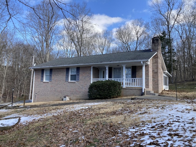 view of front of home featuring covered porch