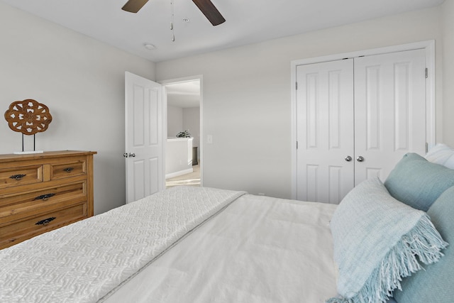 bedroom with ceiling fan and a closet