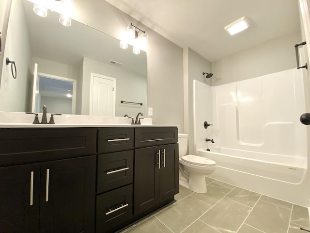 full bathroom with shower / bathtub combination, vanity, and toilet