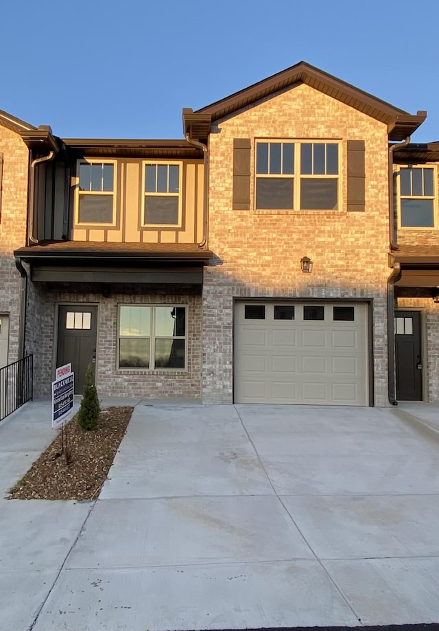 view of front of home with a garage