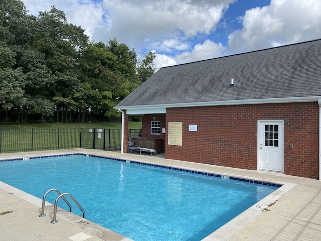 view of pool featuring a patio