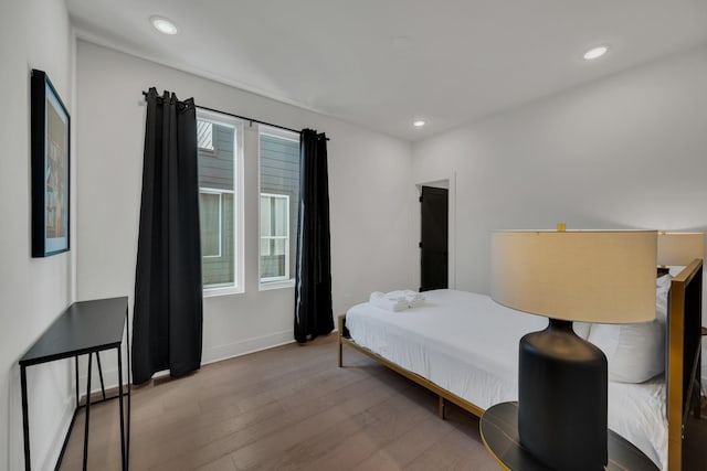 bedroom featuring light wood-type flooring