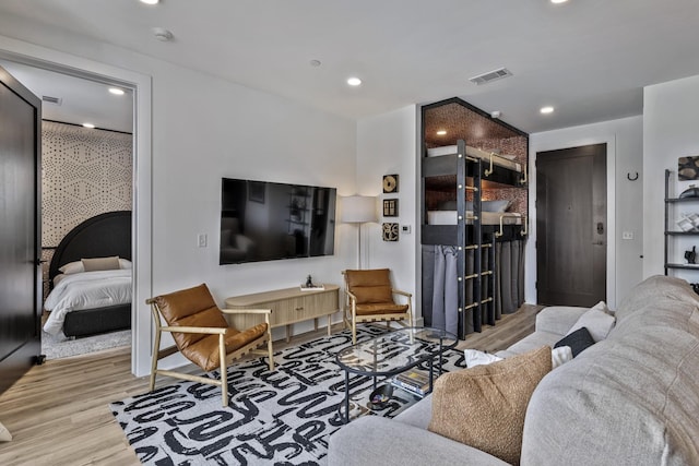 living room with light hardwood / wood-style floors