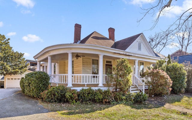 view of front of home with a porch and ceiling fan