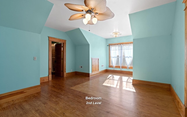 bonus room featuring ceiling fan and hardwood / wood-style floors