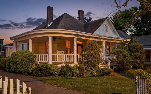 518 Forest Ave, Chattanooga, TN 37405 - victorian house with covered porch, ceiling fan, and a chimney