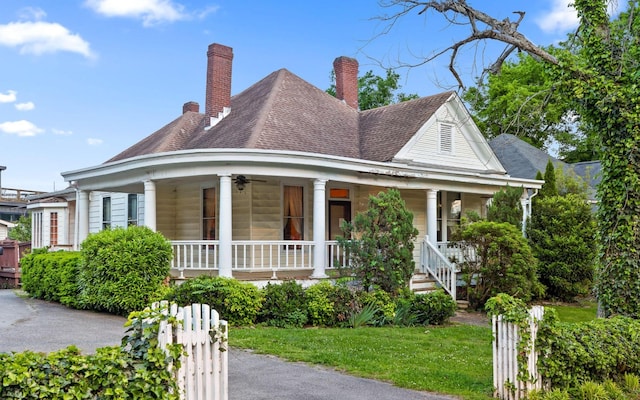 518 Forest Ave, Chattanooga, TN 37405 - country-style home with ceiling fan, roof with shingles, covered porch, and a chimney