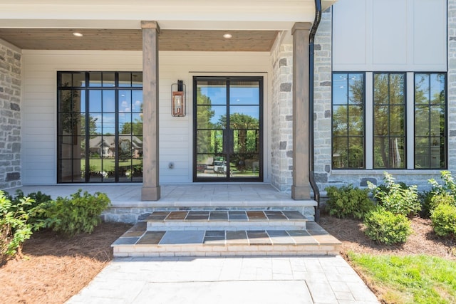 property entrance featuring covered porch