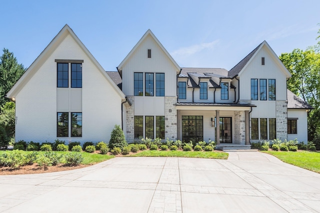 modern farmhouse style home featuring a porch